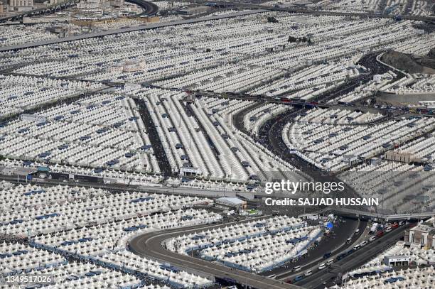 An aerial view of rows of tents housing Muslim pilgrims in Mina, near the holy city of Mecca on June 30, 2023.