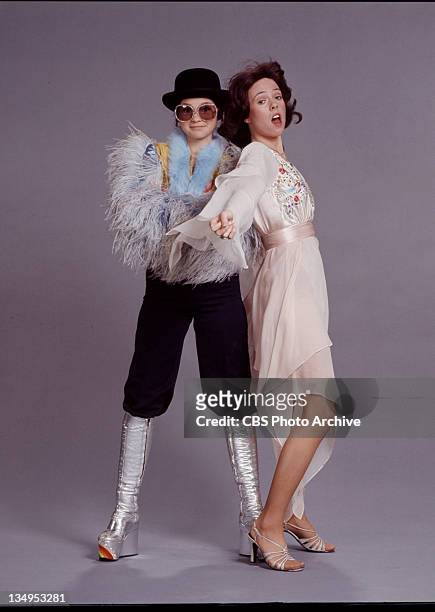 Cast members Valerie Bertinelli and Mackenzie Phillips as Elton John and Kiki Dee , pose for episode: 'Happy New Year'. Image dated December 1976.
