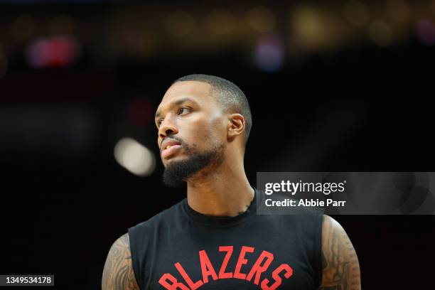Damian Lillard of the Portland Trail Blazers looks on before the game against the Memphis Grizzlies at Moda Center on October 27, 2021 in Portland,...