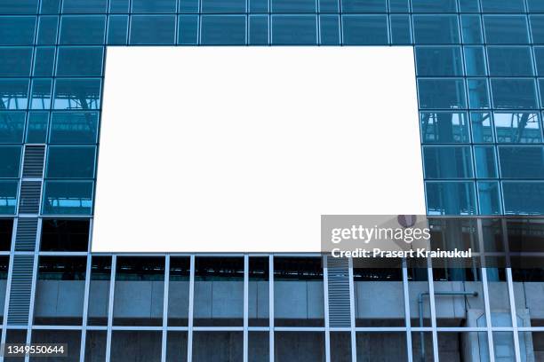 billboard on the modern building - blank placard stock pictures, royalty-free photos & images