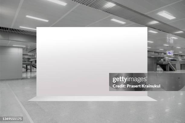 sign and billboard mockup. mock up large blank white billboard on walkway - mall interior photos et images de collection