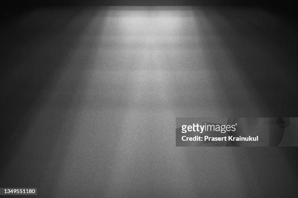 empty wall with downlight. spotlight beams on the wal - grey gradient stock pictures, royalty-free photos & images