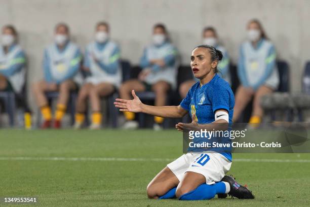 Brazil's Marta Vieira Da Silva on her knees after being tackled during the Women's International Friendly match between the Australian Matildas and...