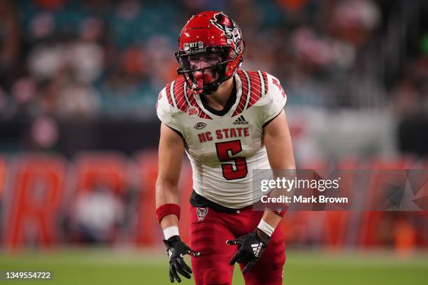 Thayer Thomas of the North Carolina State Wolfpack in action against the Miami Hurricanes at Hard Rock Stadium on October 23, 2021 in Miami Gardens,...