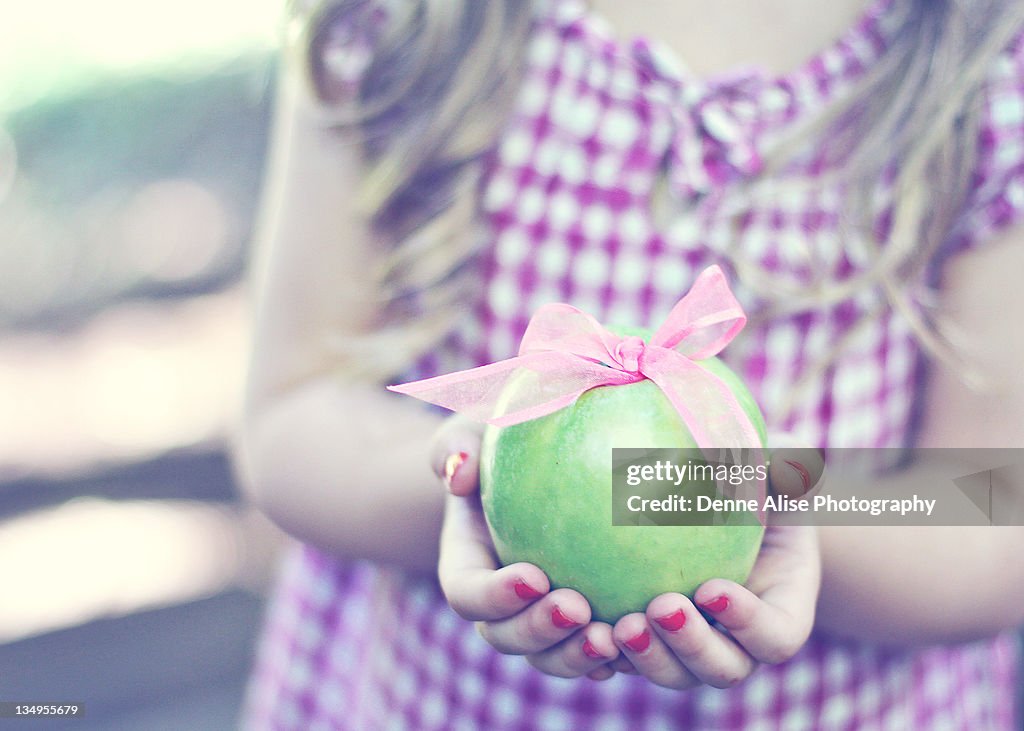 Girl with apple
