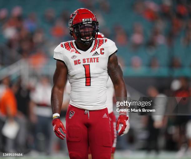 Isaiah Moore of the North Carolina State Wolfpack in action against the Miami Hurricanes at Hard Rock Stadium on October 23, 2021 in Miami Gardens,...