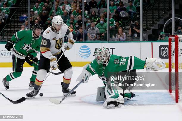 Anton Khudobin of the Dallas Stars blocks a shot on goal against Nicolas Roy of the Vegas Golden Knights in the second period at American Airlines...