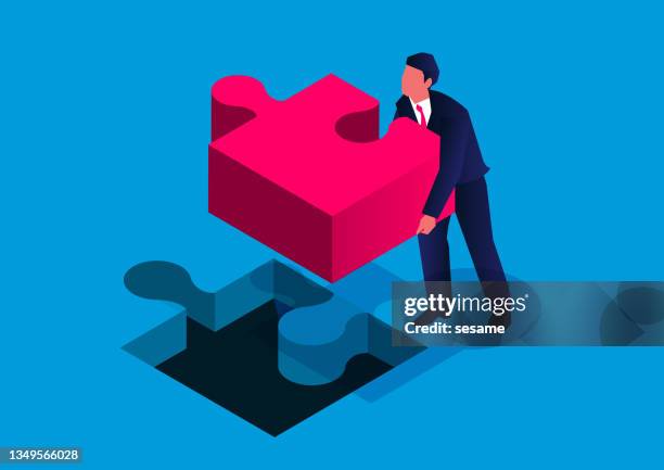 isometric businessmen install the last piece of the team puzzle - part of the solution stock illustrations