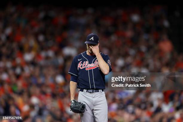 Drew Smyly of the Atlanta Braves reacts after allowing a one run home run to Jose Altuve of the Houston Astros during the seventh inning in Game Two...