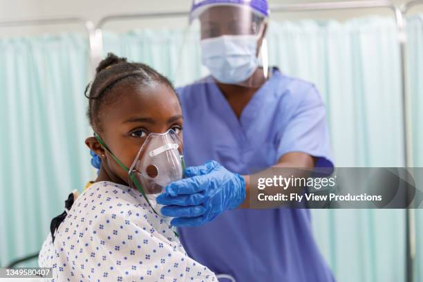 portrait of hospitalized child using medical ventilator - patient on ventilator stock pictures, royalty-free photos & images