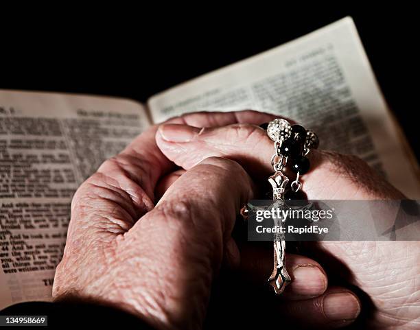 praying for salvation - praying hands with rosary beads stock pictures, royalty-free photos & images