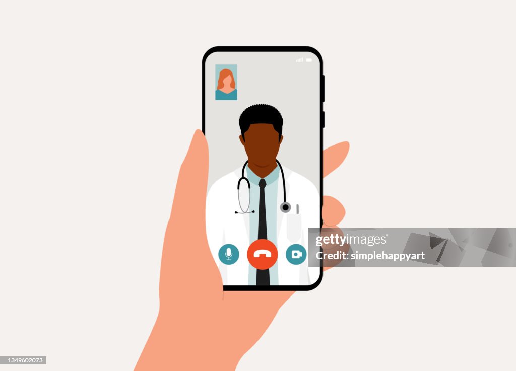 Patient Having Video Call With Black Male Doctor Using Mobile Phone. Telemedicine. Telehealth.
