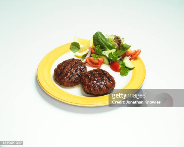 hamburger patties and salad - nobody burger colour image not illustration stock pictures, royalty-free photos & images