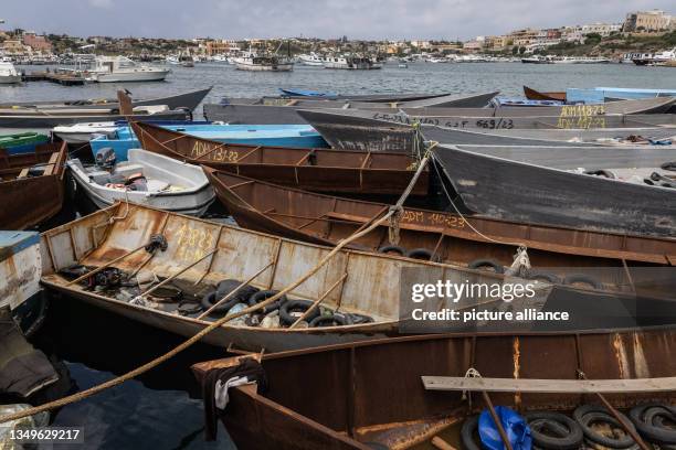 June 2023, Italy, Lampedusa: Tire tubes used as improvised life rings lie in boats in which migrants from the northern coast of Africa have crossed...