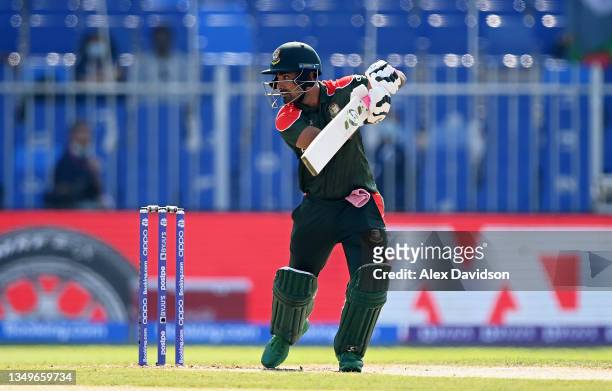 Liton Das of Bangladesh in action during the ICC Men's T20 World Cup match between Sri Lanka and Bangladesh at Sharjah Cricket Stadium on October 24,...