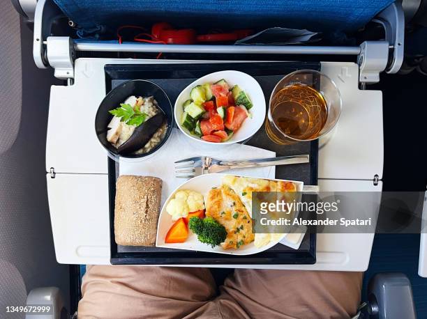 airplane food, high angle view - airline food stock-fotos und bilder