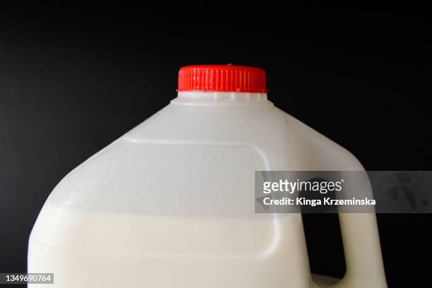milk in a plastic bottle - milchkrug stock-fotos und bilder