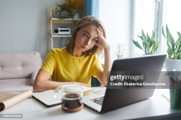 emotionally stressed business woman. - sadness home stock pictures, royalty-free photos & images