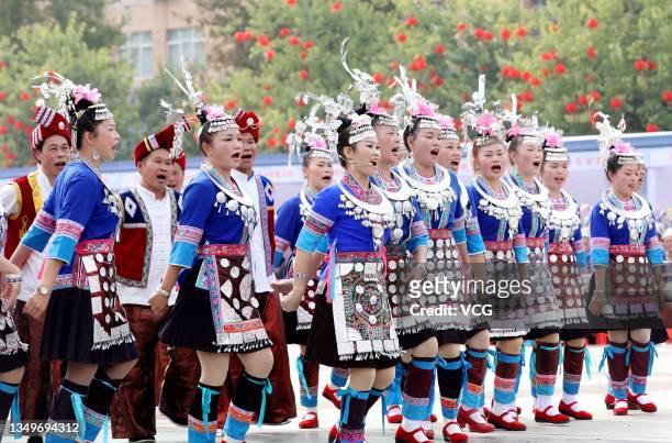 People of Dong ethnic group sing and dance during a competition as a part of the 18th China Dong minority Duoye festival at Sanjiang Dong Autonomous...