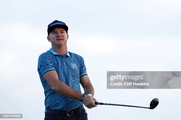 Brian Gay of the United States follows his tee shot on the 10th hole during the first round of the Butterfield Bermuda Championship at Port Royal...