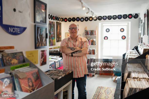 proud of his record store - insólito imagens e fotografias de stock