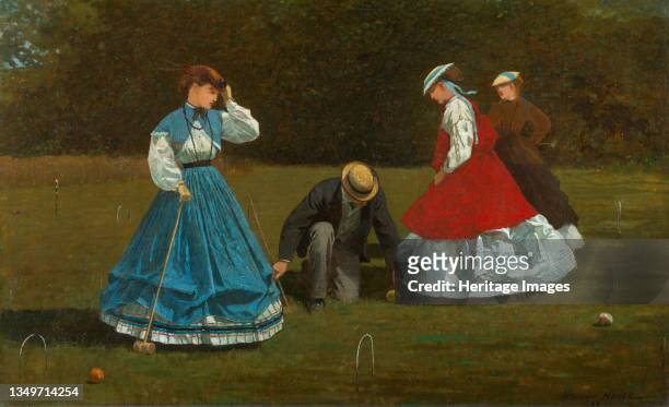 Croquet Scene, 1866. Women playing croquet which had recently been introduced into the United States from Britain. Artist Winslow Homer.