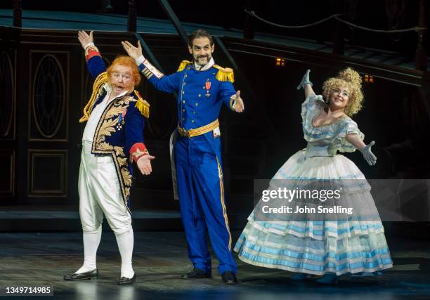 In this image released on October 29th, Les Dennis as Sir Joseph, John Savournin as Captain Corcoran and Alexander Oomens as Josephine perform on...