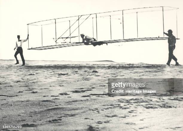 Wright Brothers' Glider Tests, Kitty Hawk, North Carolina, USA, October 10, 1902. Historic photo of the Wright brothers' third test glider being...