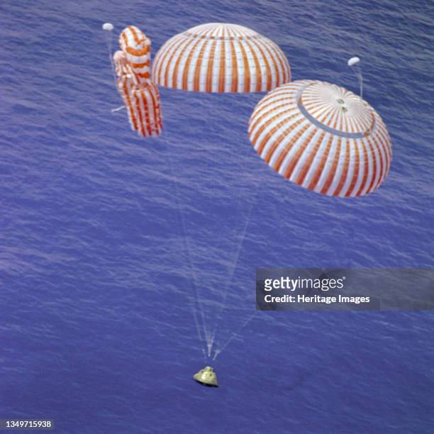 Endeavour Nears Splashdown, 1971. The Apollo 15 Command Module "Endeavour", with Astronauts David R. Scott, Alfred M. Worden and James B. Irwin...