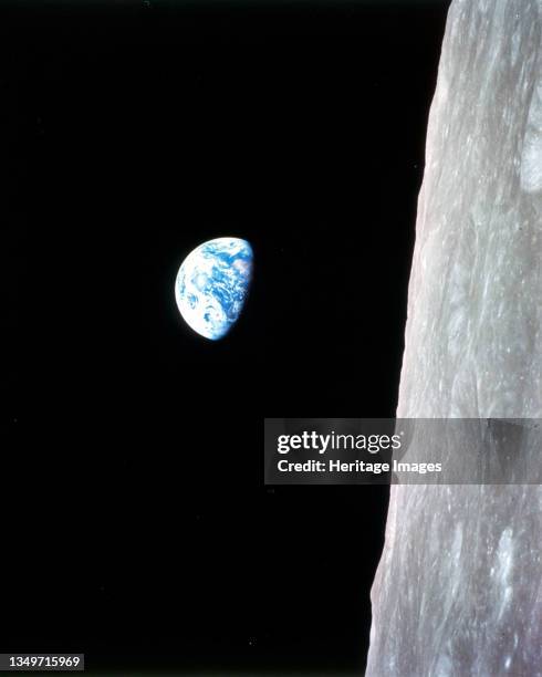 Earthrise - Apollo 8, December 24, 1968. This view of the rising Earth greeted the Apollo 8 astronauts as they came from behind the Moon after the...