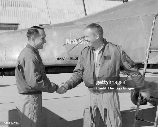 Fred Drinkwater congratulating Neil Armstrong, California, USA, February 1964. Test pilot Fred Drinkwater congratulating Neil Armstrong on his first...