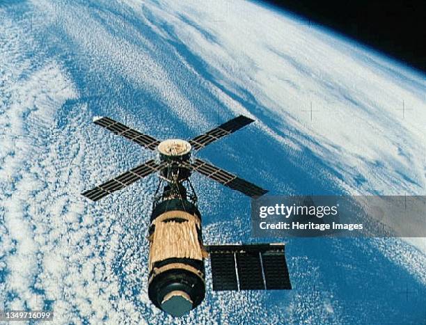 Skylab orbiting the Earth, 1970s. Launched in May 1973, Skylab was America's first experimental space station. It contained solar arrays, an...