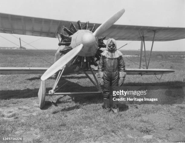 Wright Apache and pilot, Virginia, USA, 1928. A Langley Memorial Aeronautical Laboratory test pilot prepares to fly the Apache to high altitude. The...