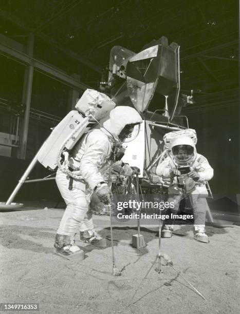 Apollo 11 Crew During Training Exercise, 1969. Two members of the Apollo 11 lunar landing mission participate in a simulation of deploying and using...