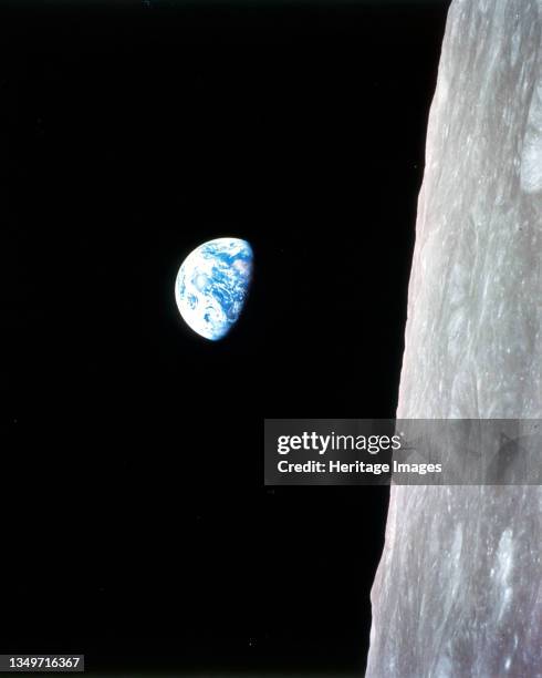 Earthrise - Apollo 8, December 24, 1968. This view of the rising Earth greeted the Apollo 8 astronauts as they came from behind the Moon after the...