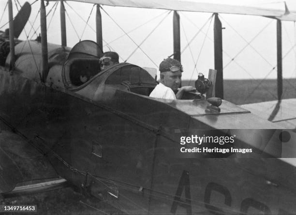Test pilot and engineer, USA, 1920. 'Double the pilots double the trouble'. Goggles at the ready, this test pilot and engineer conducted research...
