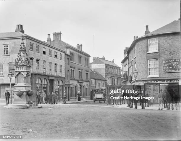 Bell Street, Henley-on-Thames, South Oxfordshire, Oxfordshire, 1890. Looking towards the street from Hart Street, with the drinking fountain of 1885...