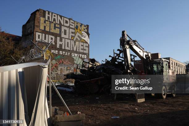 Wagons and other mobile housing of former squatting residents stand stacked at the Köpi leftist squat during the removal on October 28, 2021 in...