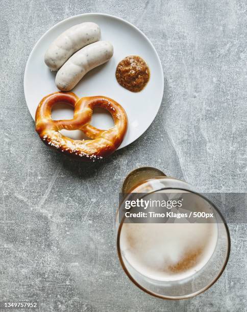 high angle view of donuts in plate on table,lehrte,germany - biergarten stock-fotos und bilder