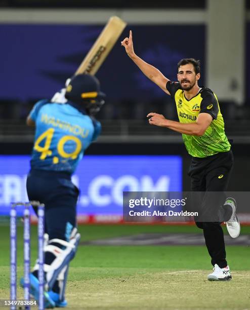 Mitchell Starc of Australia celebrates the wicket of Wanindu Hasaranga of Sri Lanka during the ICC Men's T20 World Cup match between Australia and...