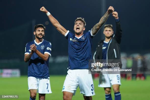 Spal players celebrate with fans the victory of the Serie B match between Ascoli v Spal at Stadio Cino e Lillo Del Duca on October 28, 2021 in Ascoli...