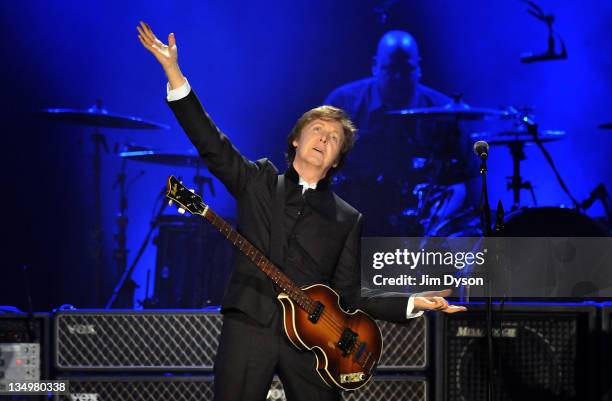 Sir Paul McCartney performs live on stage at O2 Arena on December 5, 2011 in London, United Kingdom.