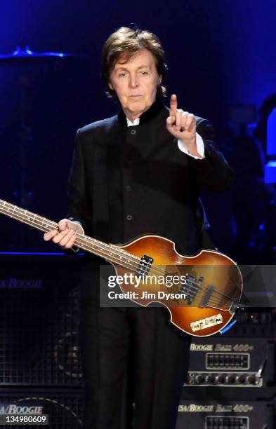 Sir Paul McCartney performs live on stage at O2 Arena on December 5, 2011 in London, United Kingdom.