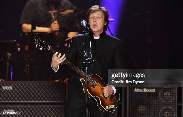 Sir Paul McCartney performs live on stage at O2 Arena on December 5, 2011 in London, United Kingdom.