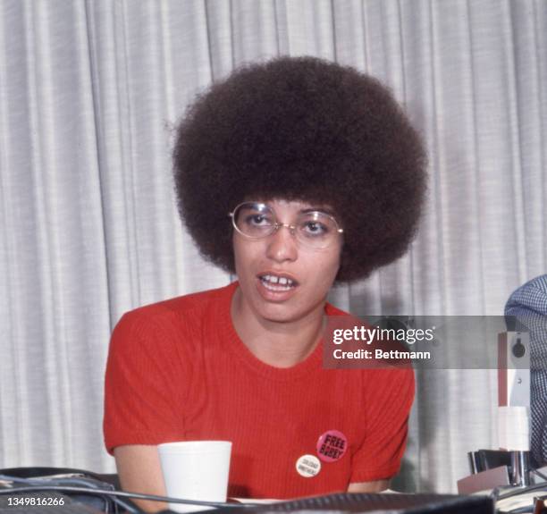 Black activist Angela Davis is shown during a press conference.