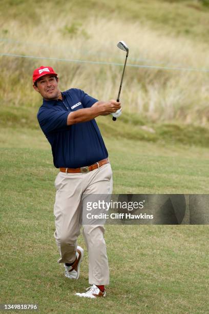 Johnson Wagner of the United States plays a shot on the 13th hole during round one of the Butterfield Bermuda Championship at Port Royal Golf Course...