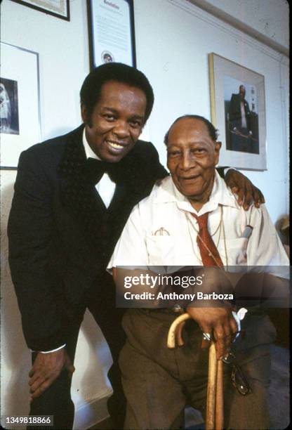 Portrait of American R&B musician Lou Rawls and photograher James Van Der Zee , 1980. The photo was taken during the sessions for Rawls' 'Shades of...