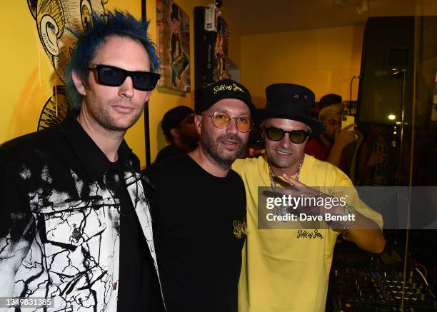 Marc Jacques Burton, Nic Fanciulli and Alec Monopoly attend a private view of Alec Monopoly's new exhibition "Sold As Seen" created in collaboration...