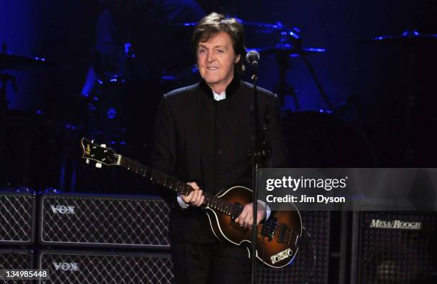 Sir Paul McCartney performs live on stage at O2 Arena on December 5, 2011 in London, United Kingdom.