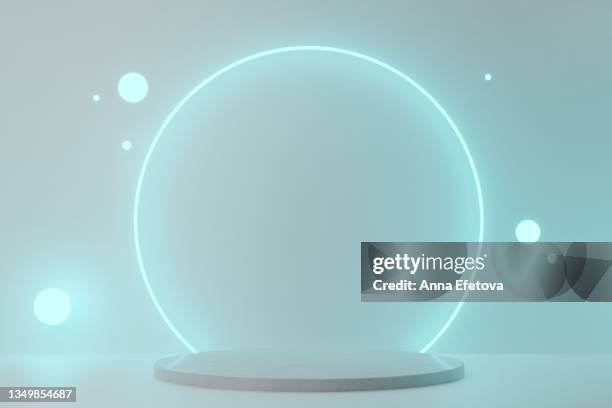 round blue ceramic podium with neon backlighting on abstract white background with lighting circles. perfect platform for showing your products. three dimensional illustration - white backdrop - fotografias e filmes do acervo